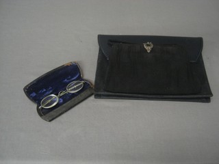 A pair of vintage spectacles together with a lady's evening bag with marcasite clip and a lady's blue leather and suede evening bag decorated the RAF crest