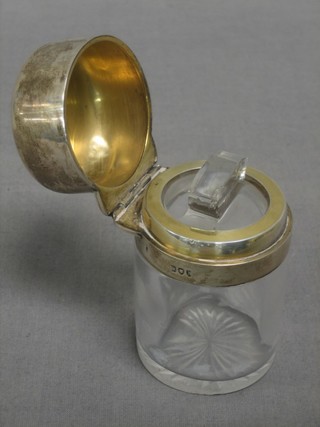A Victorian cylindrical glass dressing table jar with silver hinged lid, London 1892
