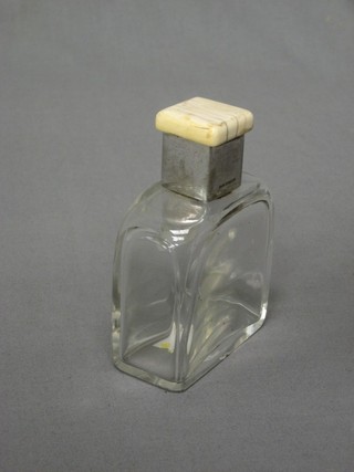 An Art Deco glass perfume bottle with silver and ivory mount, London 1940 (bottle chipped to base)