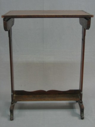 A Victorian rectangular rosewood occasional table, raised on standard end supports 22"