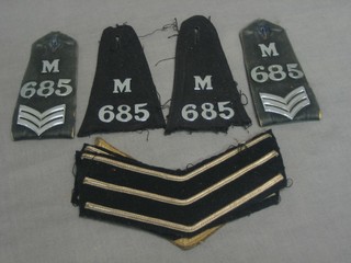 A pair of Police Sergeants Motor Division epaulettes, a pair of Constable do., 2 pairs of Police Sergeants stripes and a pair of Army Sargeant stripes