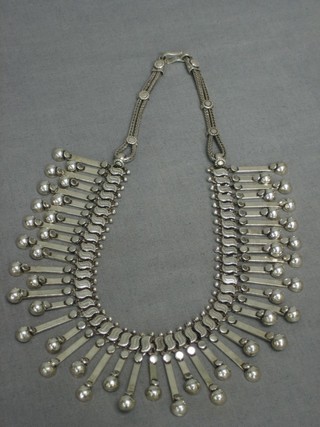 A silver filigree necklet