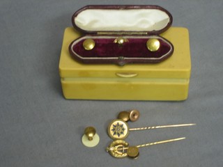 2 gilt metal stick pins and 6 gold studs