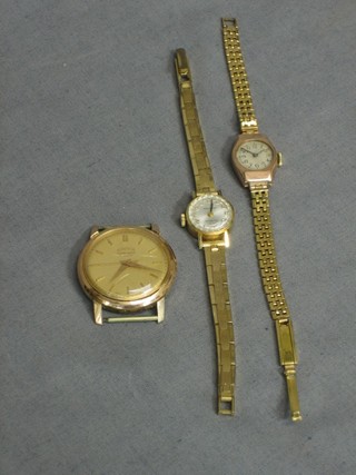 A lady's Mondaine wristwatch contained in a 14ct gold case, 1 other gold cased wristwatch and a gentleman's Roamer wristwatch