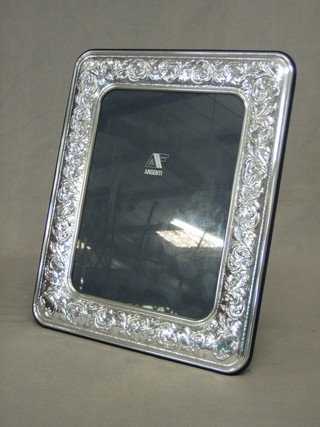 A modern silver easel photograph frame 12" x 9 1/2"