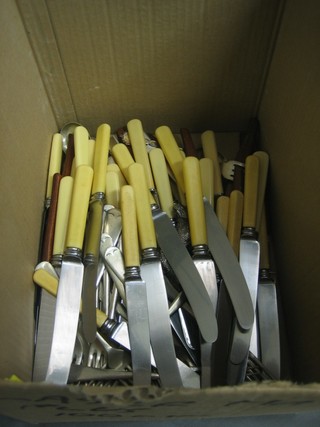 A collection of various silver plated flatware