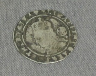 An Elizabeth I silver coin 1574 and 1 other