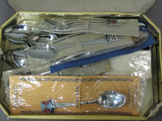 A collection of enamelled souvenir spoons