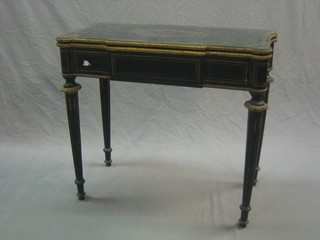 A 19th Century French ebonised and inlaid brass card table with hinged lid (f), raised on turned and fluted supports 32"