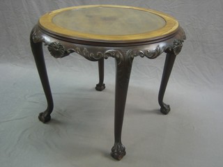 An Edwardian circular mahogany Chippendale style occasional table with plate glass top, top raised on cabriole ball and claw supports 29"
