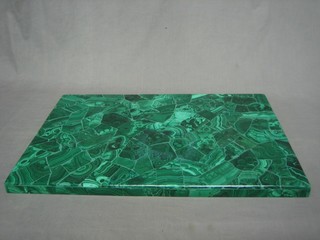 A rectangular section of polished malachite 23 1/2" x 15 1/2"