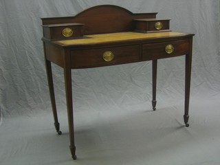 A Georgian style mahogany writing table with raised back fitted 2 short drawers, the top with inset tooled leather writing surface, the base fitted 2 drawers, raised on square tapering supports ending in spade feet 42"