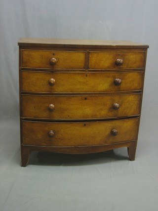 A 19th Century mahogany bow front chest of 2 short and 3 long drawers, raised on bracket feet 40"