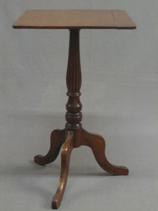 A square Victorian mahogany wine table, raised on a reeded pillar and tripod column 18" (split to top)