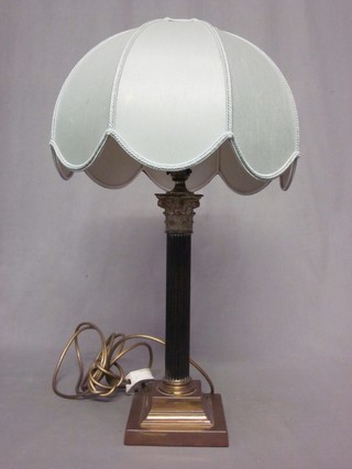 A metal reeded table lamp with stepped base and Corinthian column capital 14 1/2"
