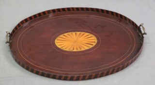 A 19th Century oval inlaid mahogany twin handled tea tray 23"