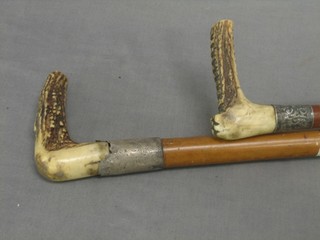 2 walking sticks with stag horn handles