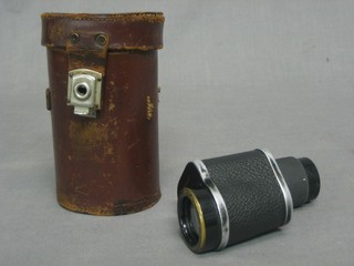 A Kershaw 6 x 30 monocular contained in a leather case