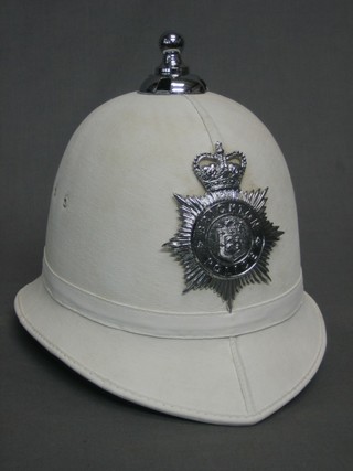 A Brighton Police white Police helmet with Elizabeth II helmet plate, converted for use as a motor scooter helmet