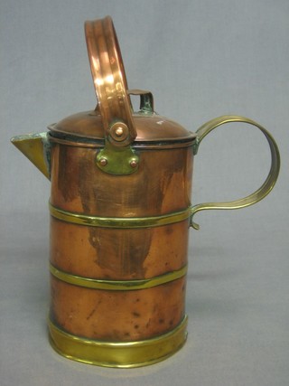 A copper and brass jug with swing handle 8"