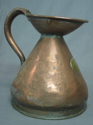 A copper harvest measure with an oval brass plaque marked Imperial Gallon Standard, William McNeill
