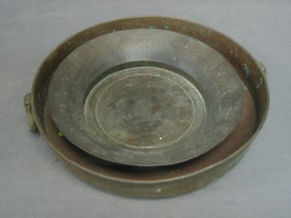 A circular Eastern copper bowl 14" and 1 other 11"