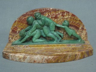 An Art Deco onyx and bronze standish, the back decorated a bronze figure group of people pushing, signed Careves? 12"