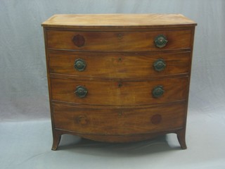 A Georgian mahogany bow front chest of 4 long drawers with brass drop handles, raised on splayed bracket feet 39"