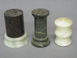 A turned marble column 5", a rectangular marble plaque and 4 other marble columns