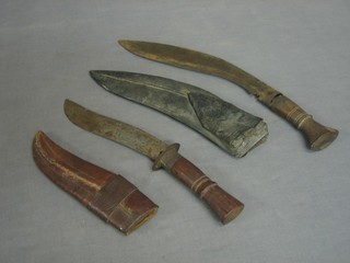A Kukri with 10 1/2" blade and wooden grip together with a shaped dagger with 7 1/2" blade, wooden grip and leather scabbard