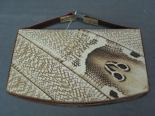 A lady's snakeskin bag 