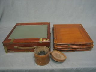 A mahogany folding plate camera/photographic enlarger with Carl Zeiss NR 126246 lens and 3 plate carriers