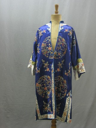 An Oriental blue silk embroidered jacket