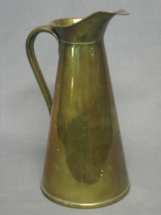 A waisted brass jug 14"