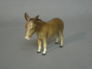 A Beswick figure of a donkey 3 1/2"