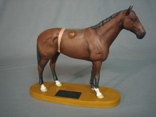 A Beswick figure in the form of The Race Horse Nijinsky, raised on an oval base