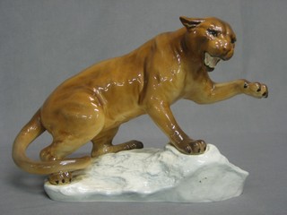 A Beswick pottery figure of a panther, the base marked 1702 8"