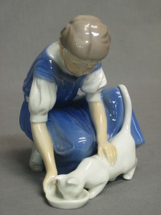 A B & G Copenhagen porcelain figure of  a seated girl with cat, the base marked 1745 HT 6"