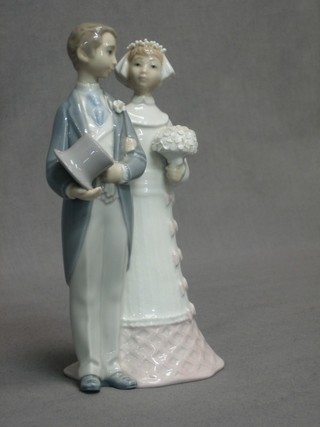 A Lladro figure - Bride and Groom 7"
