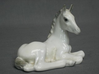 A Soviet Russian figure of a seated grey horse 5"