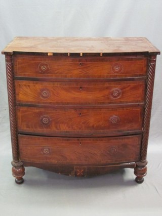 A William IV mahogany bow front chest of 4 long drawers with spiral turned column to the sides 40" (split to top and no handles)