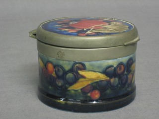 A cylindrical Moorcroft jar and cover with hinged lid, the base marked Moorcroft AA162 3 1/2" (lid heavily f and r)