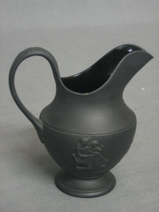 An 18th/19th Century black basalt cream jug 4"