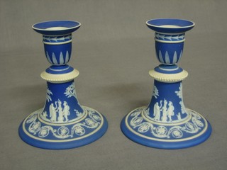 A pair of Wedgwood blue Jasperware candlesticks, the bases impressed Wedgwood 5, 5"