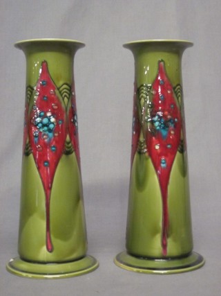 A pair of Minton green glazed vases, the bases marked no.1 12" (both chipped, f and r)