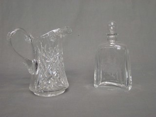 An etched glass decanter and stopper decorated Romeo and Juliet, the base signed and a cut glass jug 8"