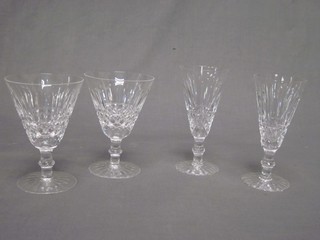 A suite of Waterford glasses comprising 8 champagne flutes and  7 wine glasses 