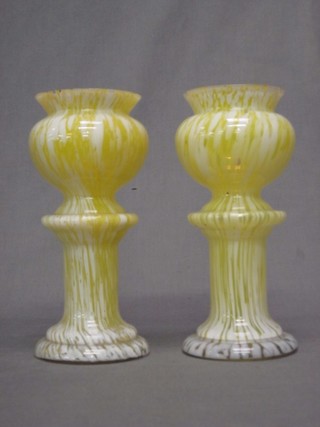 A pair of vaseline style glass pedestal vases 9 1/2"