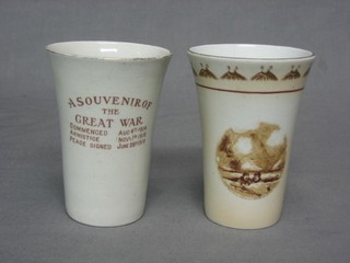 A Bairnsfather ware beaker marked  A Souvenir of The Great War 4" and a Winton pottery beaker marked Peace 1919