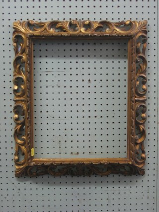 A gilt carved wood picture frame 15" x 12"